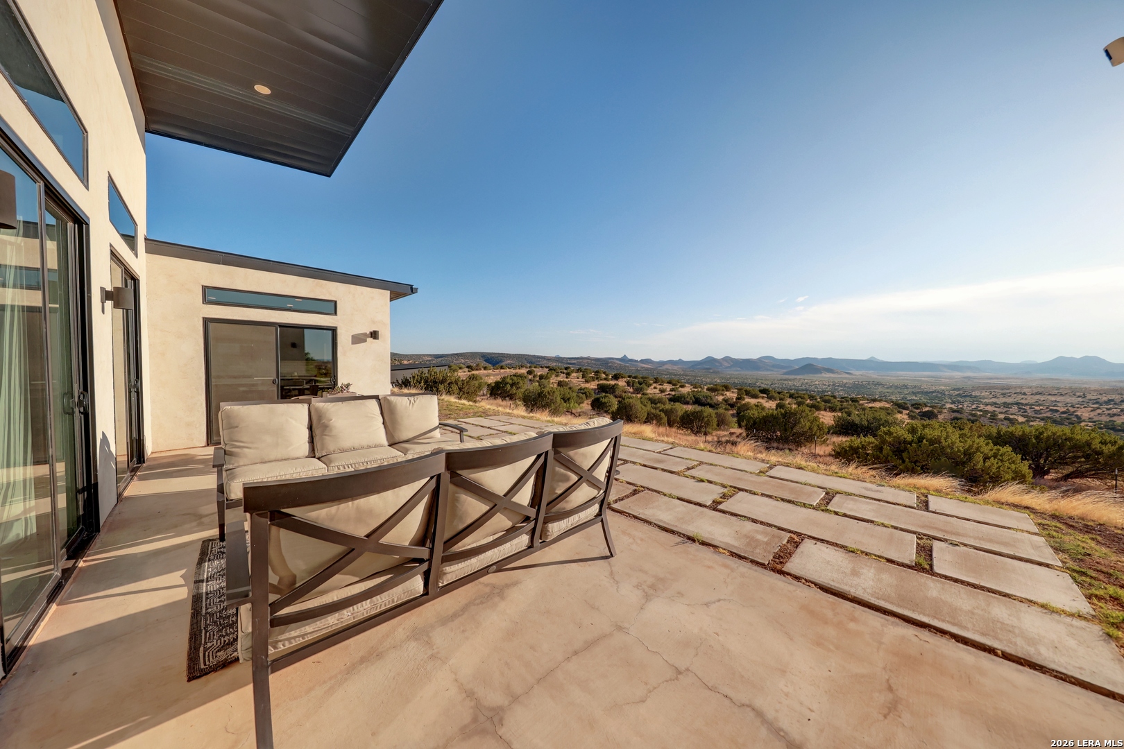 28 Scenic Ridge Road South Alpine, TX 79830 - Photo 34 of 48 a view of a terrace with furniture and city view
