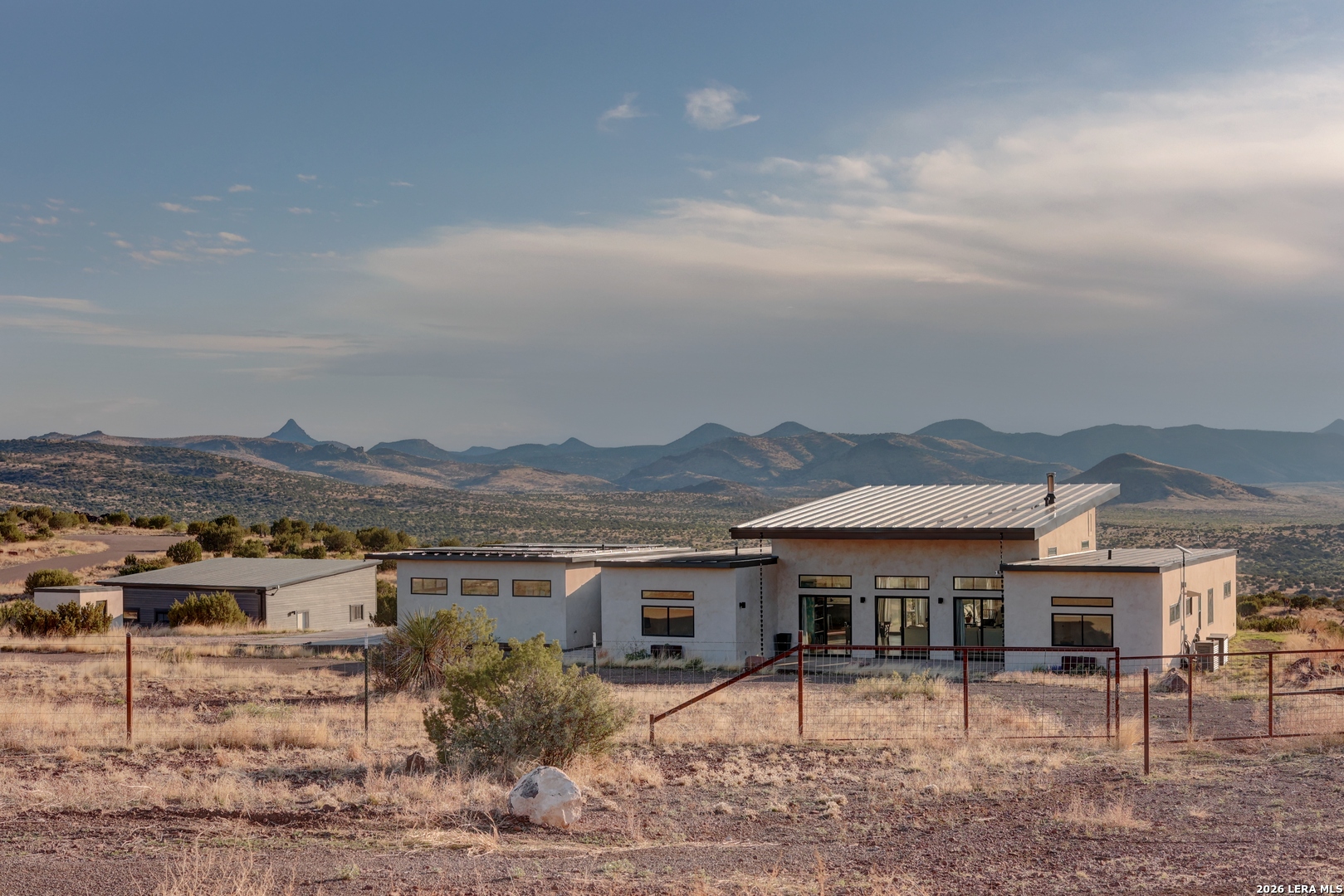 28 Scenic Ridge Road South Alpine, TX 79830 - Photo 39 of 48 a view of a house with a yard and sitting area