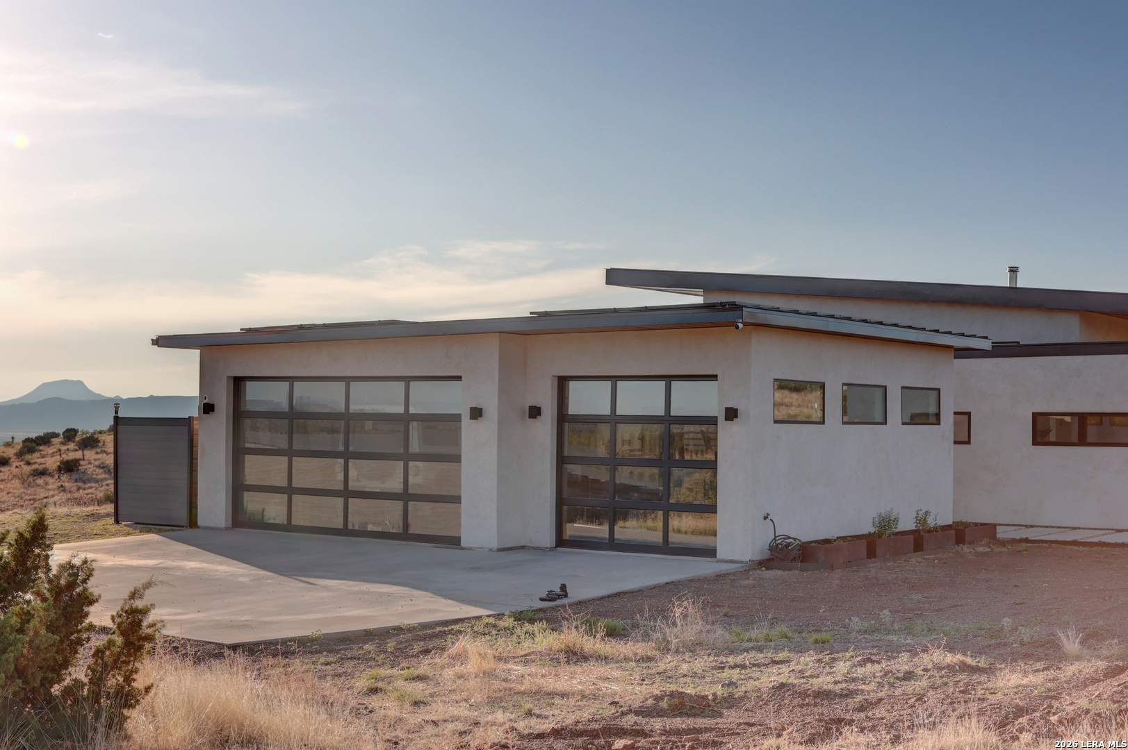 28 Scenic Ridge Road South Alpine, TX 79830 - Photo 41 of 48 a view of a house with a backyard and garage