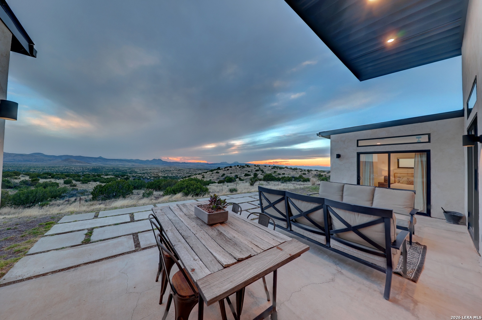 28 Scenic Ridge Road South Alpine, TX 79830 - Photo 44 of 48 a view of a terrace with furniture and a potted plant