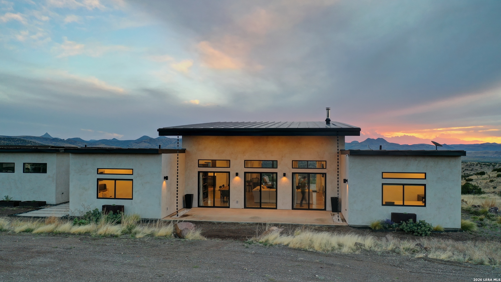 28 Scenic Ridge Road South Alpine, TX 79830 - Photo 7 of 48 a front view of a house with garage