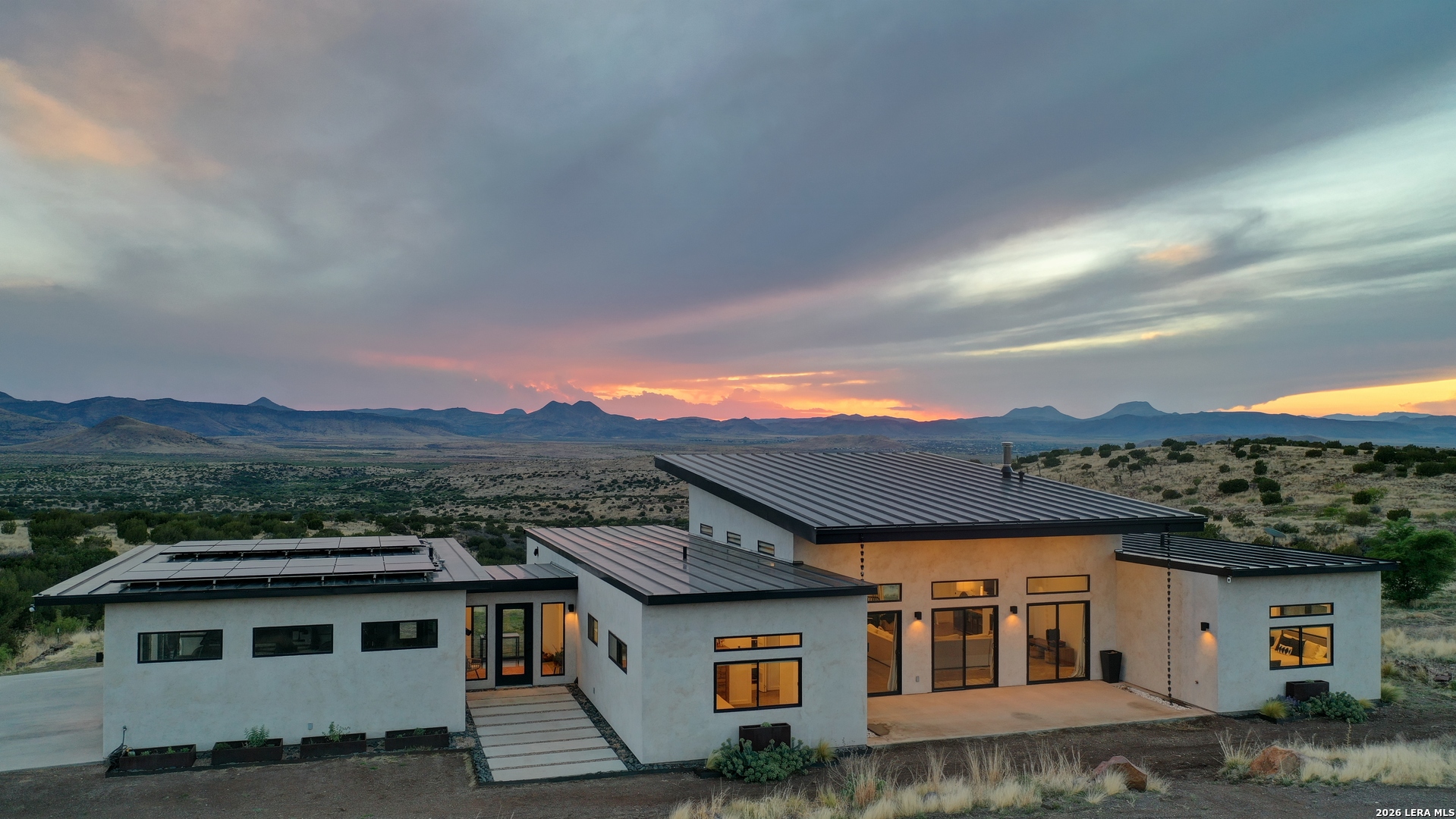 28 Scenic Ridge Road South Alpine, TX 79830 - Photo 8 of 48 a front view of a house with a yard