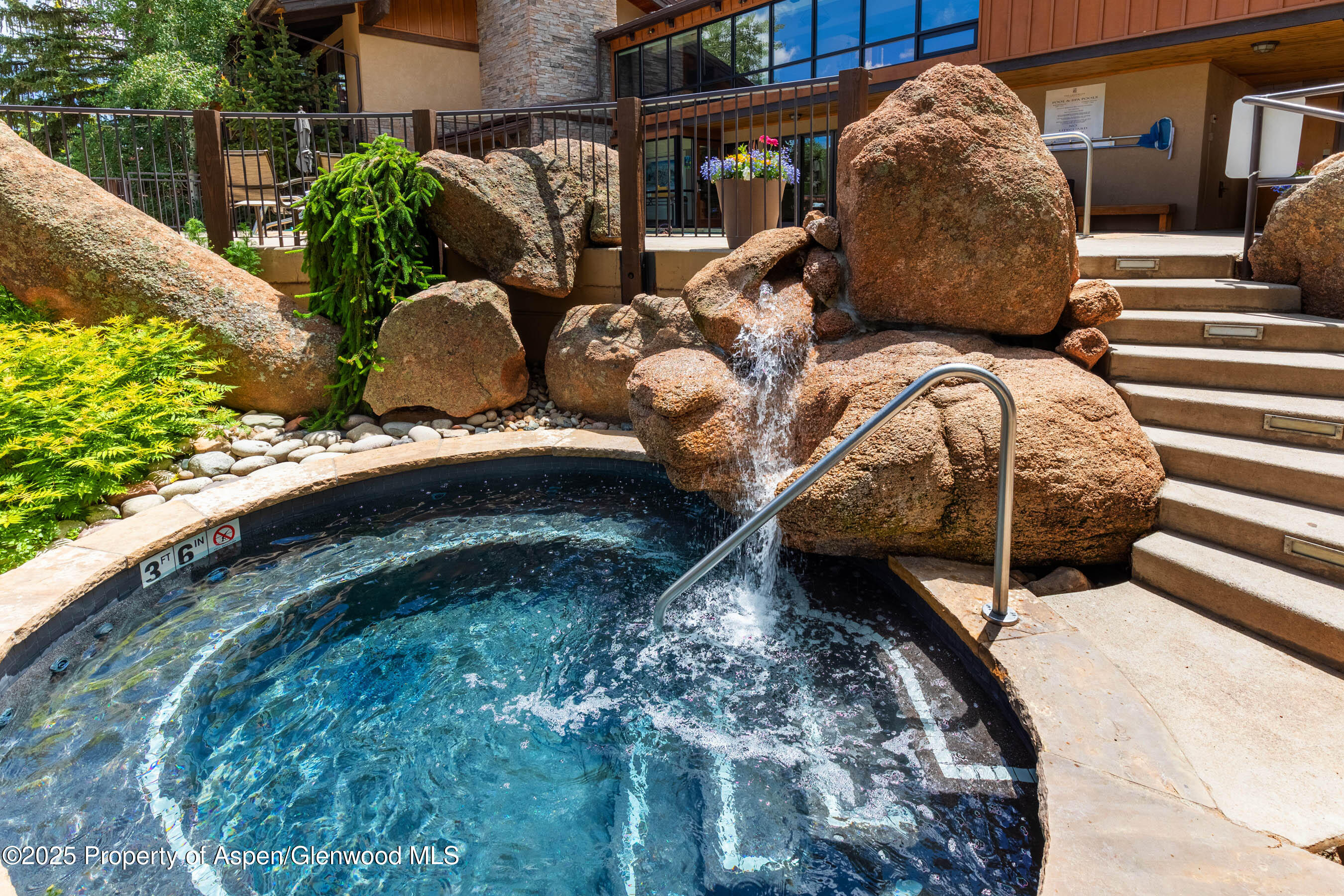 400 Wood Road, Unit 2203 Snowmass Village, CO 81615 - Photo 17 of 22 Main Pool Area 1 of 2 Hot Tubs