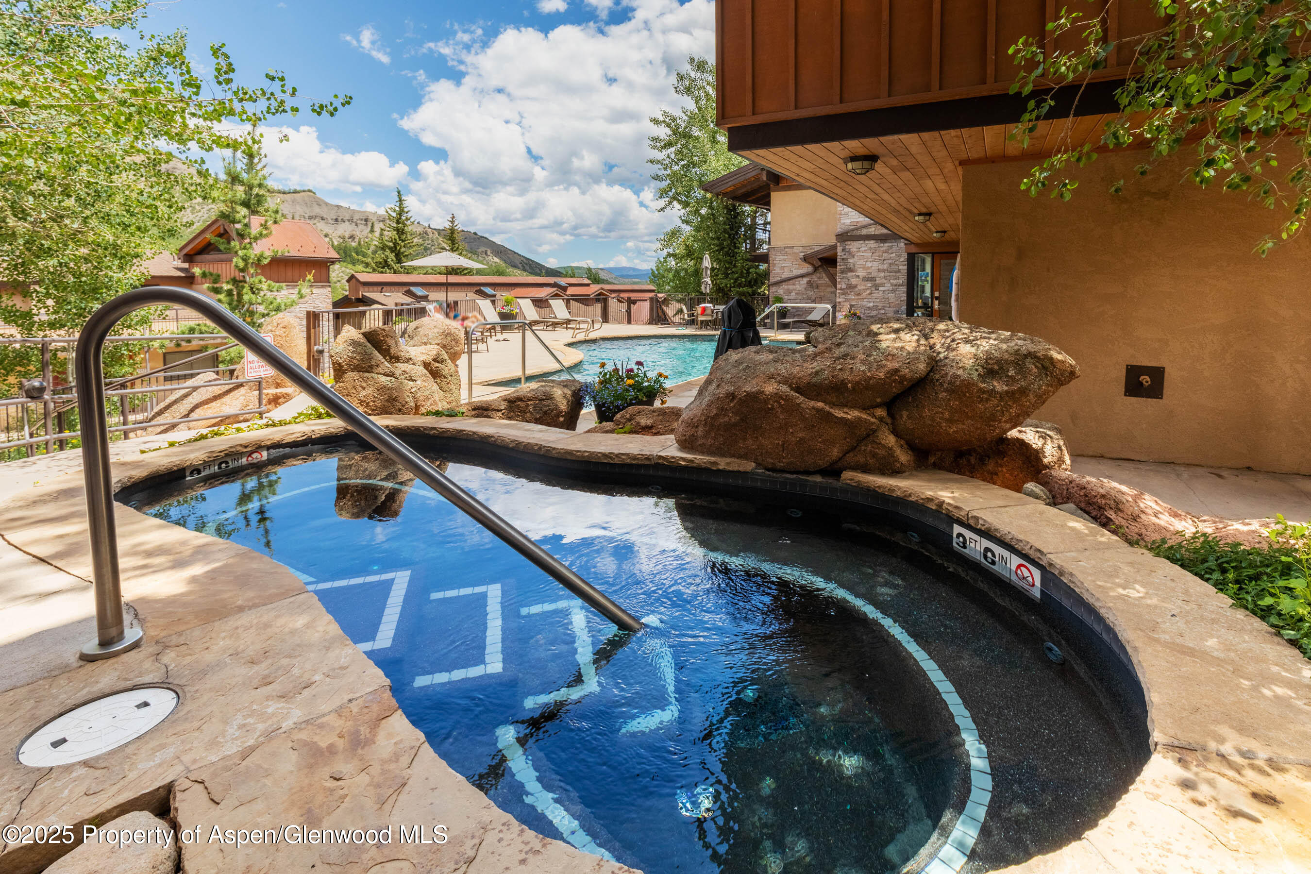 400 Wood Road, Unit 2203 Snowmass Village, CO 81615 - Photo 18 of 22 Main Pool Area 2 of 2 Hot Tubs