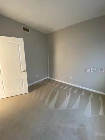 an empty room with a door