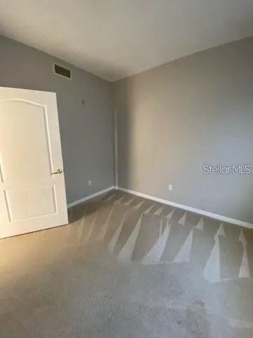 an empty room with a door