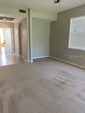a view of a livingroom with a staircase