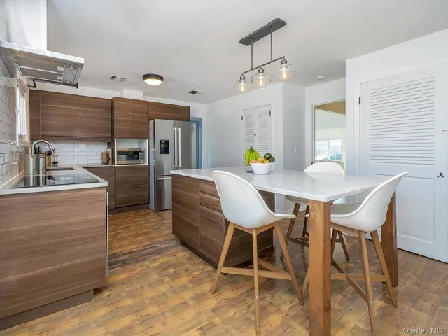 a view of a dining room with furniture