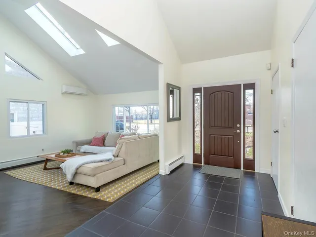 a bedroom with a bed and walk in closet