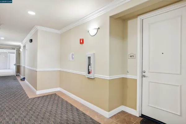a view of a hallway with closet
