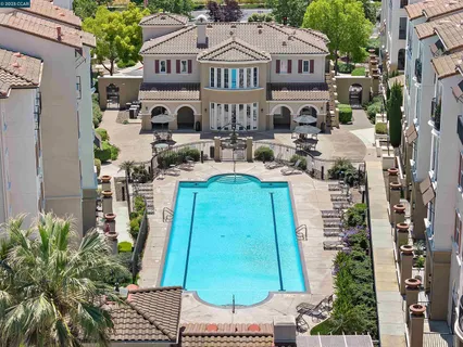 a view of a house with a yard and plants
