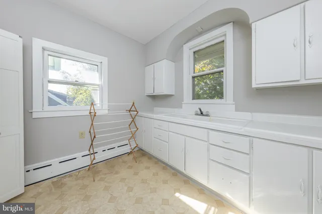 a view of a window and a sink