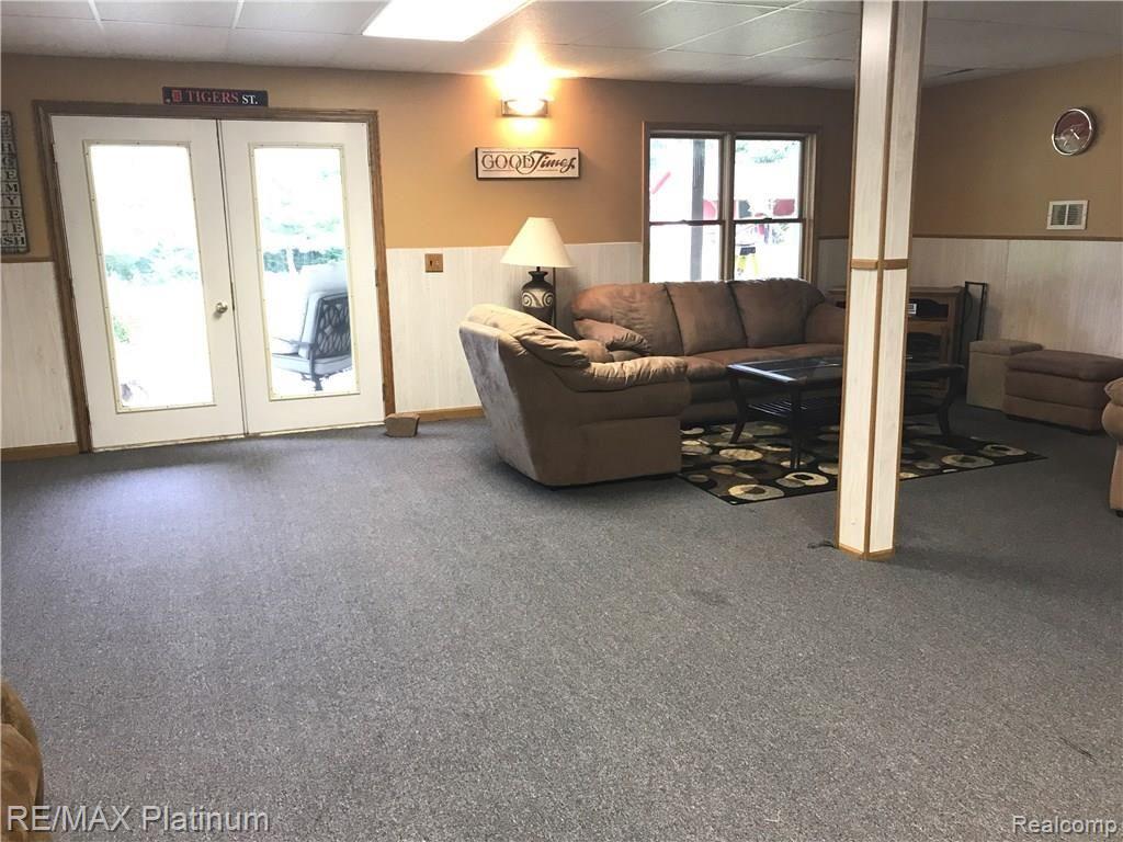 198 West Coon Lake Road Howell, MI 48843 - Photo 22 of 22 Finished walk-out basement offers plenty of room!