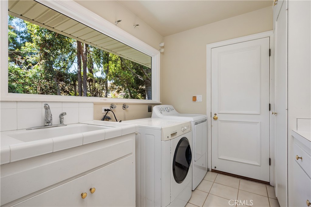 2086 Playa Road Carlsbad, CA 92009 - Photo 27 of 44 Laundry Room off the Kitchen