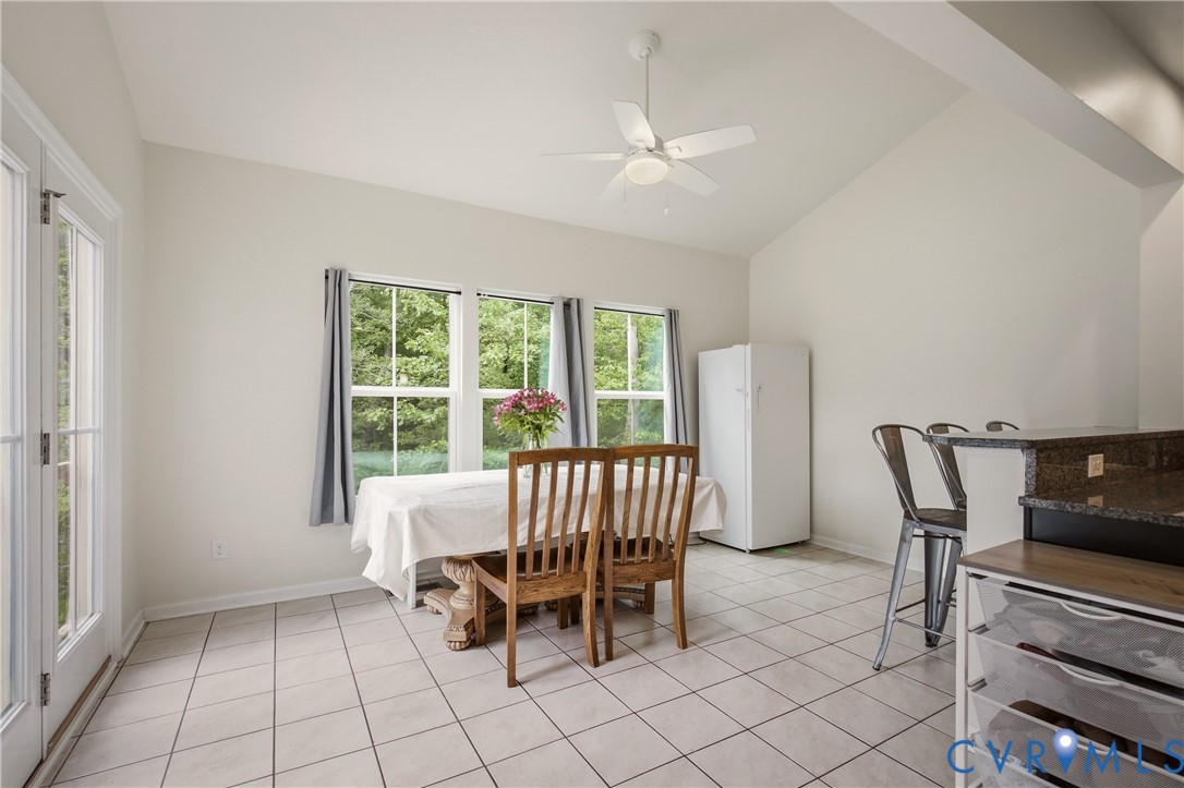9013 Bailey Hill Road Midlothian, VA 23112 - Photo 25 of 56 Open-concept dining area featuring vaulted ceiling
