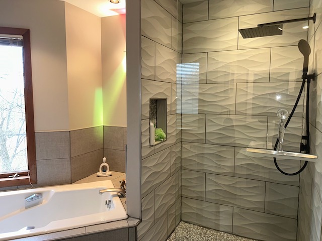 155 Forestview Drive Elgin, IL 60120 - Photo 19 of 36 a bathroom with a sink and a shower