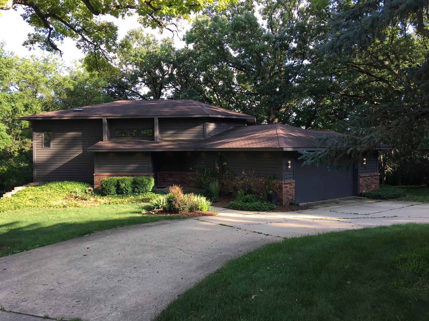 155 Forestview Drive Elgin, IL 60120 - Photo 21 of 36 a front view of a house with a yard