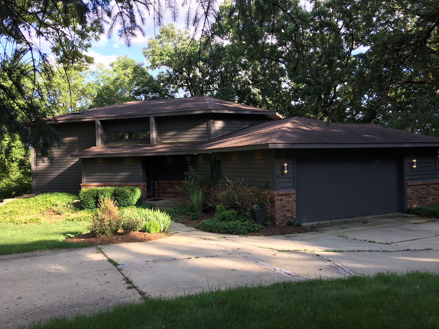 155 Forestview Drive Elgin, IL 60120 - Photo 26 of 36 a front view of a house with a yard