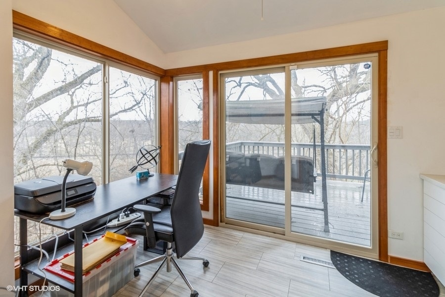 155 Forestview Drive Elgin, IL 60120 - Photo 27 of 36 a view of a workspace with furniture and a window