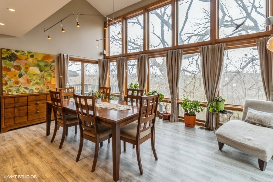 155 Forestview Drive Elgin, IL 60120 - Photo 5 of 36 a dining room with furniture window and wooden floor