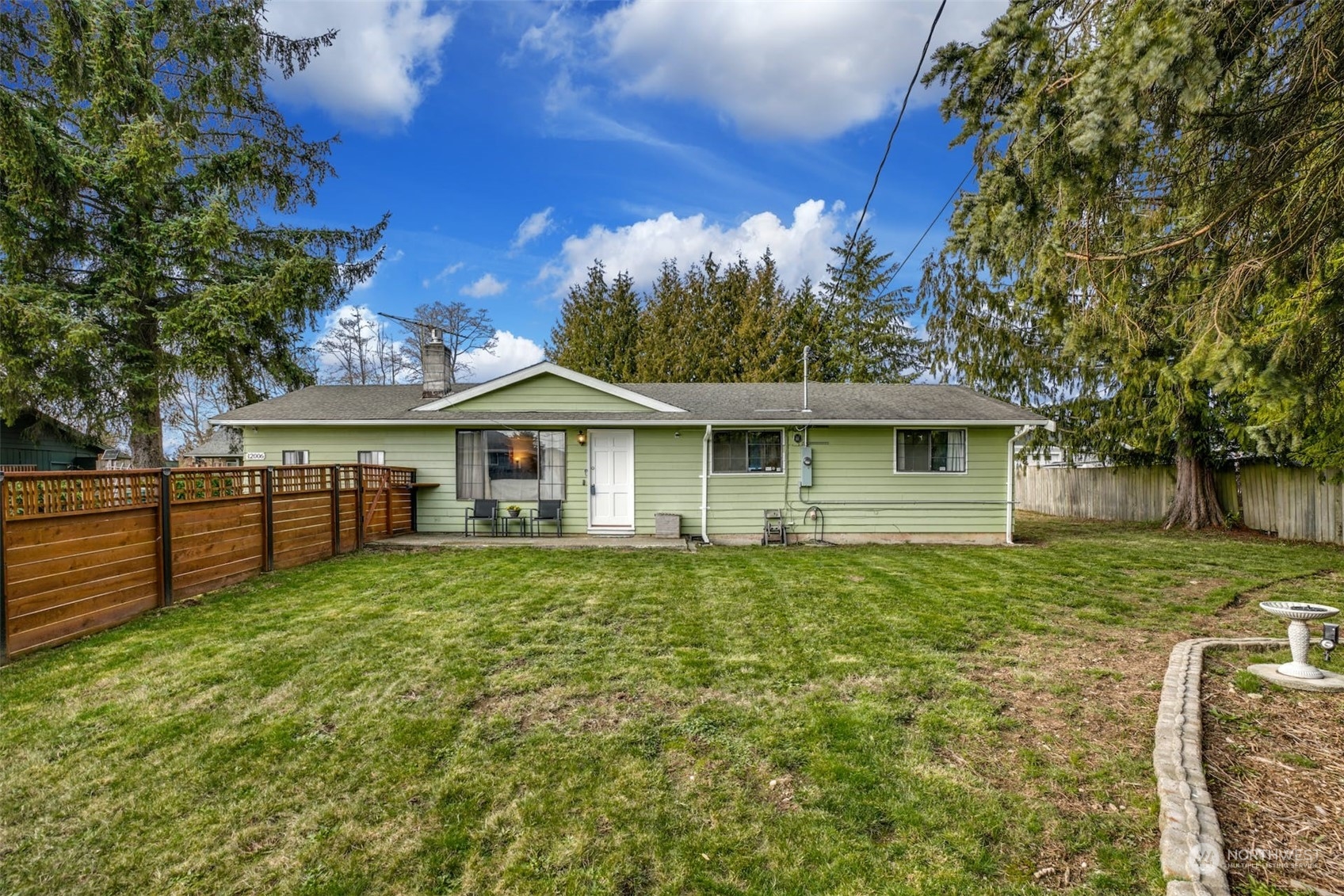 12006 Alexander Road Everett, WA 98204 - Photo 2 of 33 a front view of a house with yard