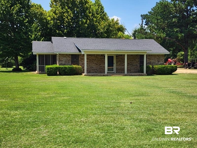 640 Horseshoe Road Brewton, AL 36426 - Photo 1 of 22 Ranch-style home featuring a front lawn