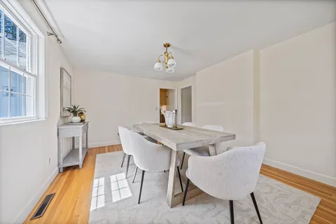 a view of a dining room with furniture