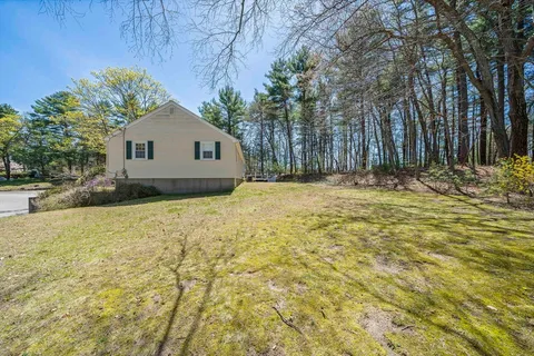 a house with yard in front of it