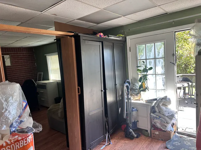 a bathroom with a mirror and a shower