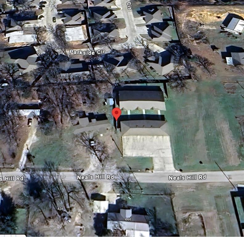 457 Neals Hill Road Oak Ridge, TX 76240 - Photo 13 of 14 an aerial view of residential houses with outdoor space