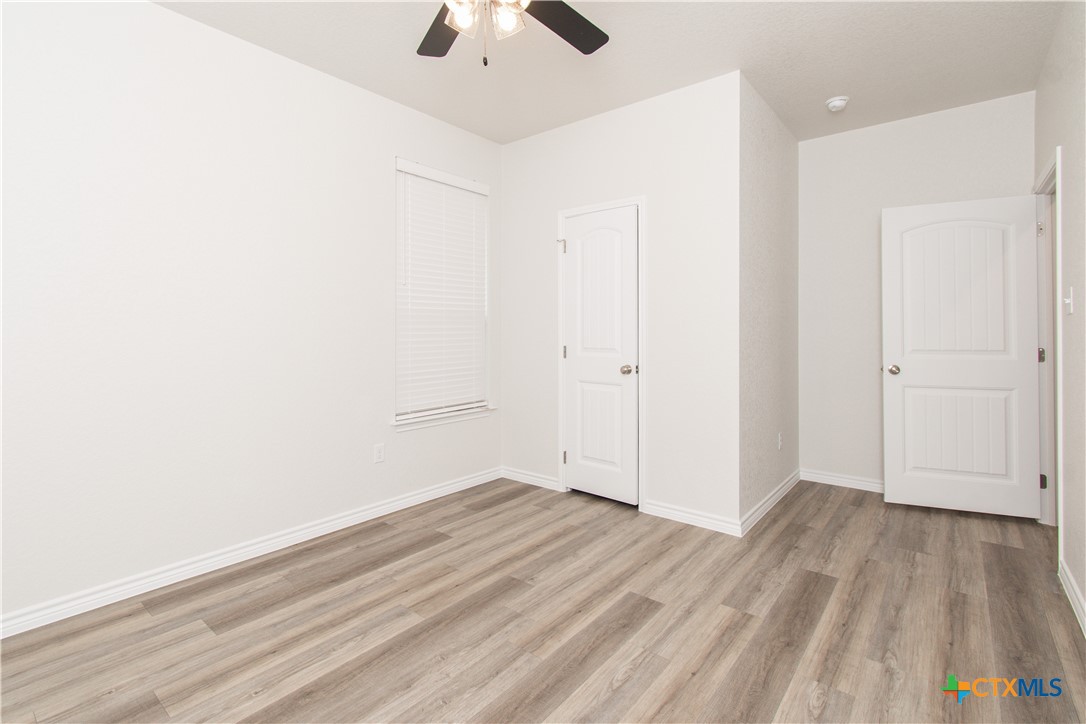 121 Leon Lane, Unit B Copperas Cove, TX 76522 - Photo 12 of 18 wooden floor in an empty room