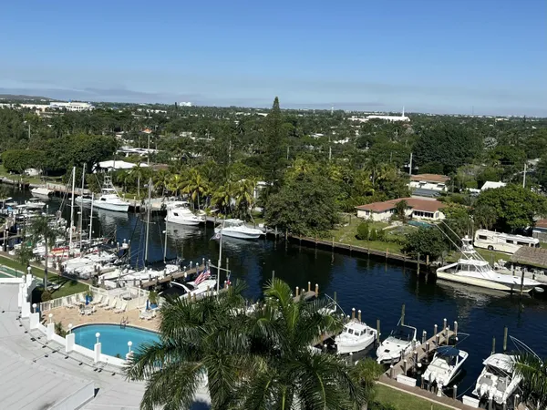 a kitchen with stainless steel appliances kitchen island granite countertop a large counter top stainless steel appliances and cabinets