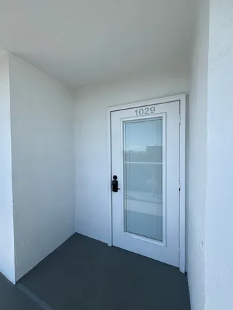 a view of city and green space