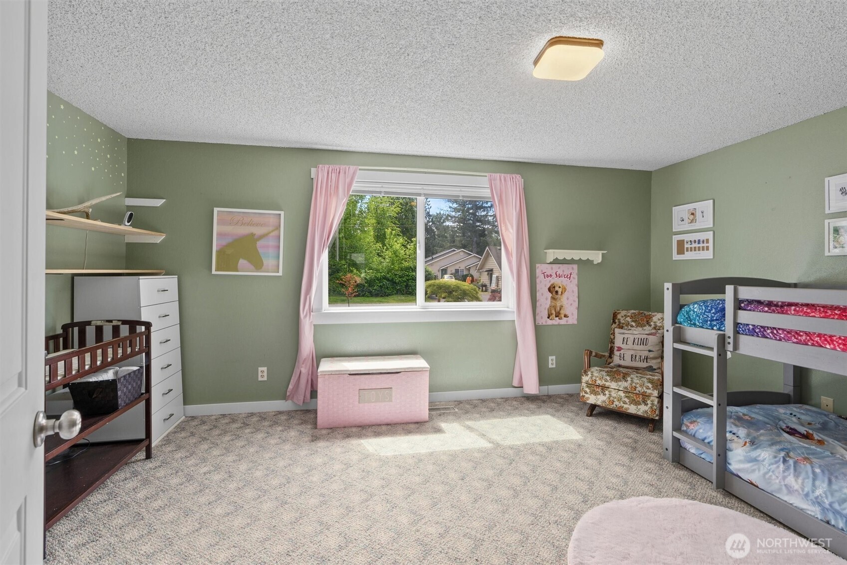 917 Dyer Road Sultan, WA 98294 - Photo 17 of 40 a bedroom with furniture and a window