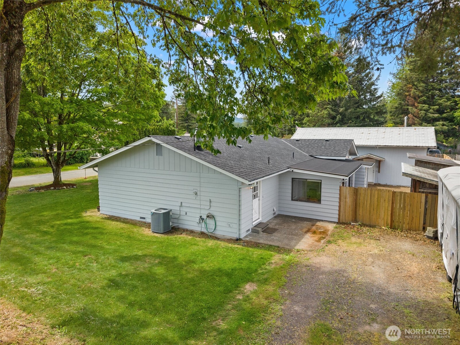 917 Dyer Road Sultan, WA 98294 - Photo 27 of 40 a view of a house with a yard