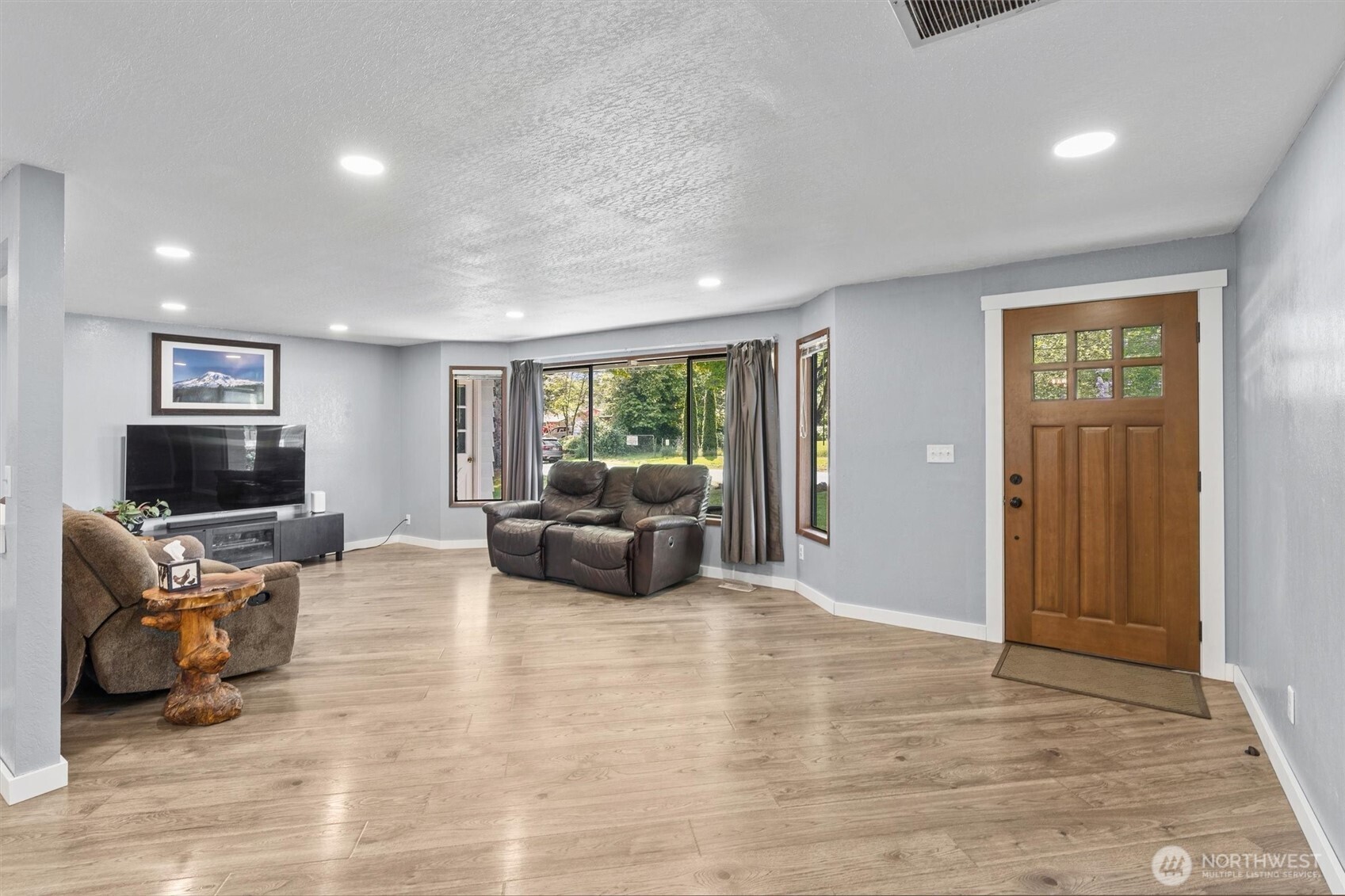 917 Dyer Road Sultan, WA 98294 - Photo 4 of 40 a living room with furniture and a flat screen tv