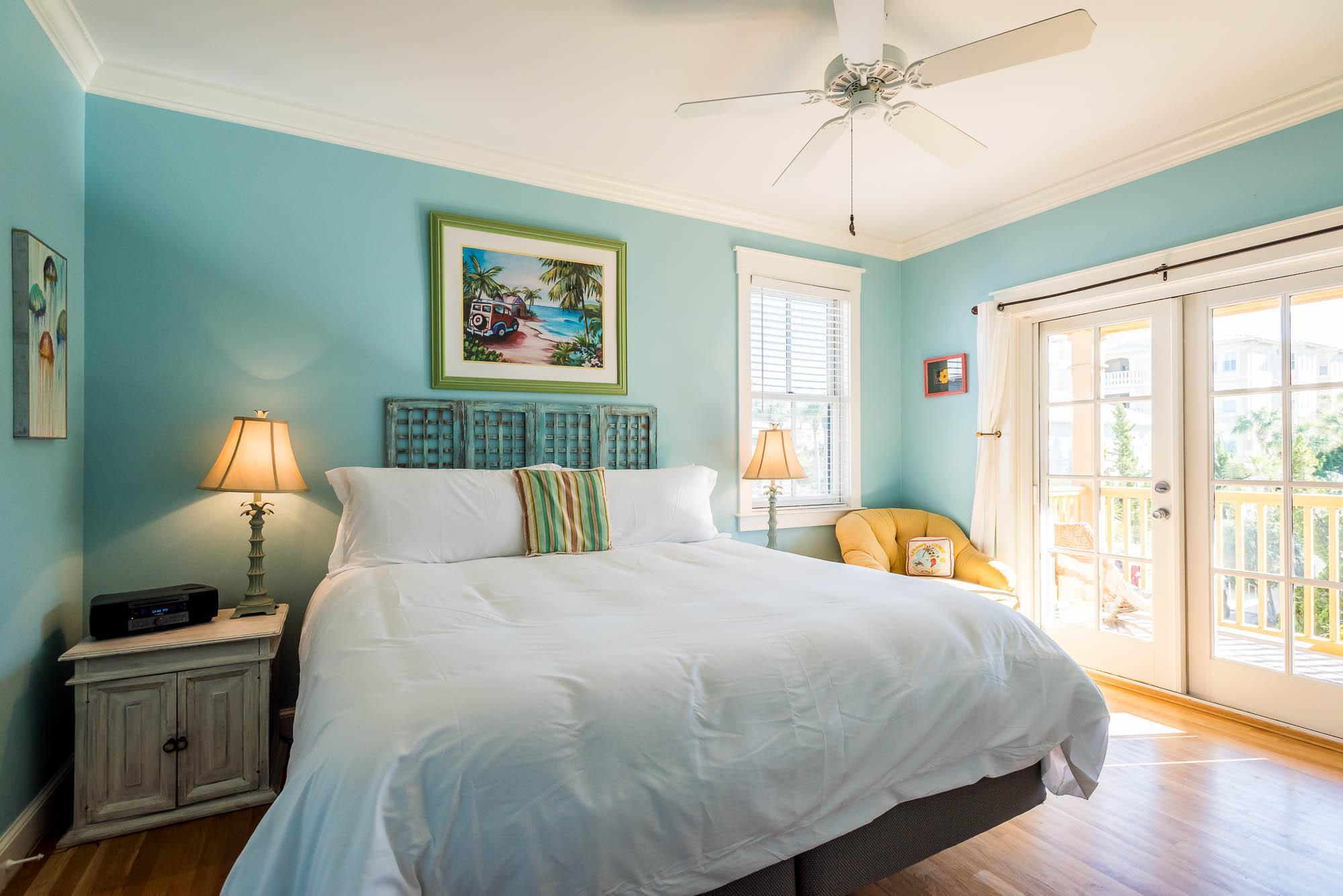 10140 East County Highway 30A, Unit 14 Inlet Beach, FL 32461 - Photo 11 of 14 a bed room with a bed and a chandelier