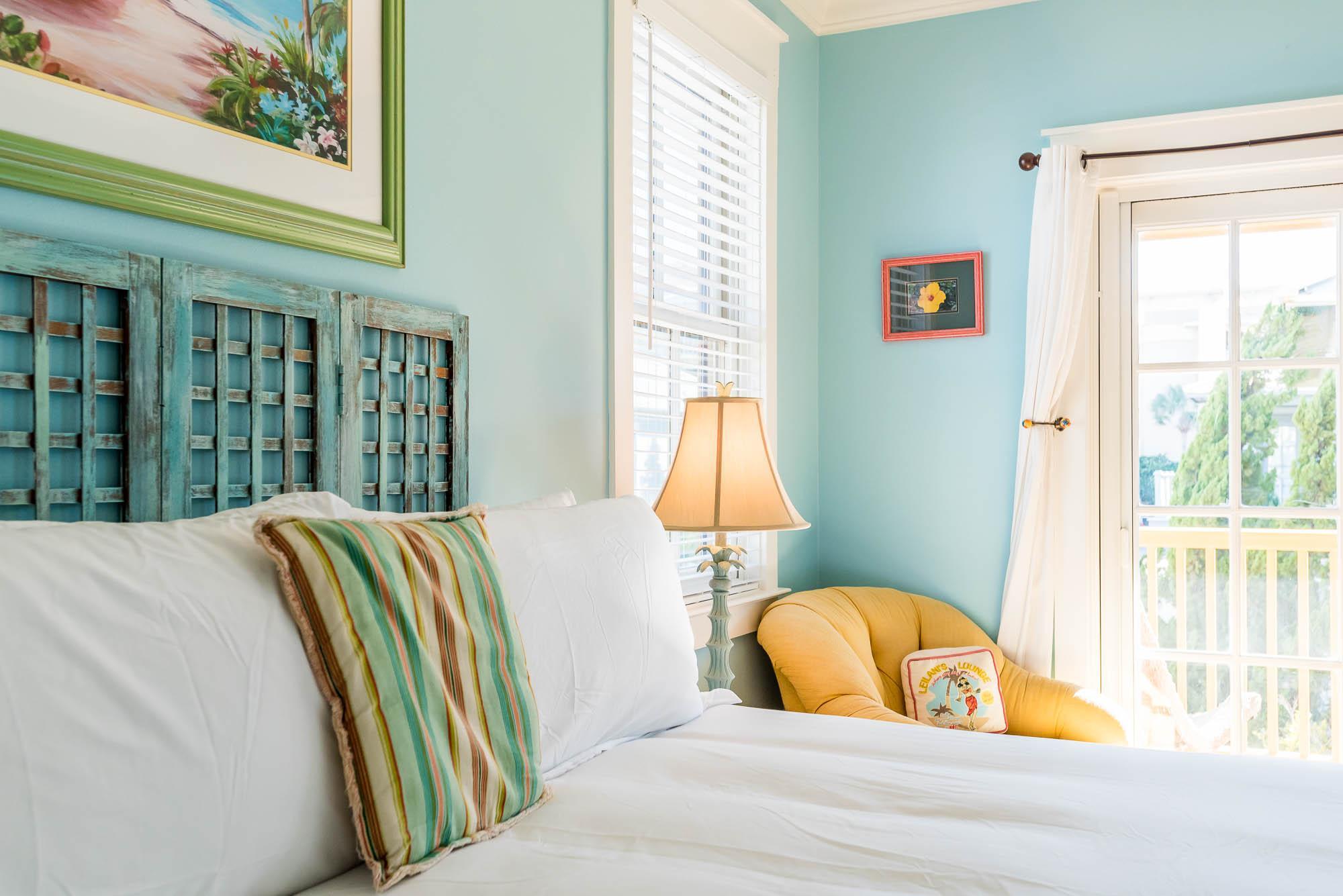 10140 East County Highway 30A, Unit 14 Inlet Beach, FL 32461 - Photo 12 of 14 a view of a bedroom with wooden floor and bed