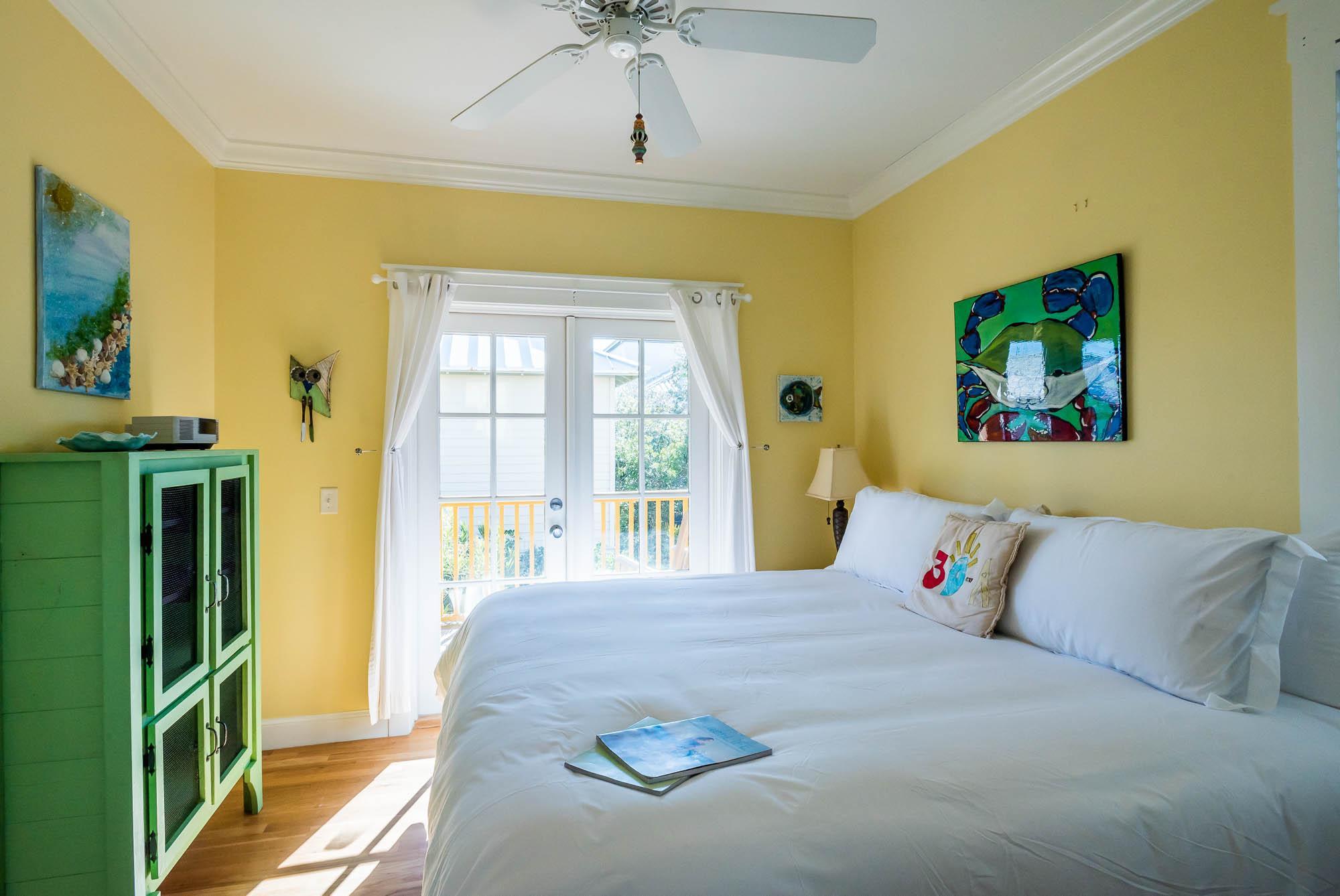 10140 East County Highway 30A, Unit 14 Inlet Beach, FL 32461 - Photo 13 of 14 a bed sitting in a bedroom next to a window