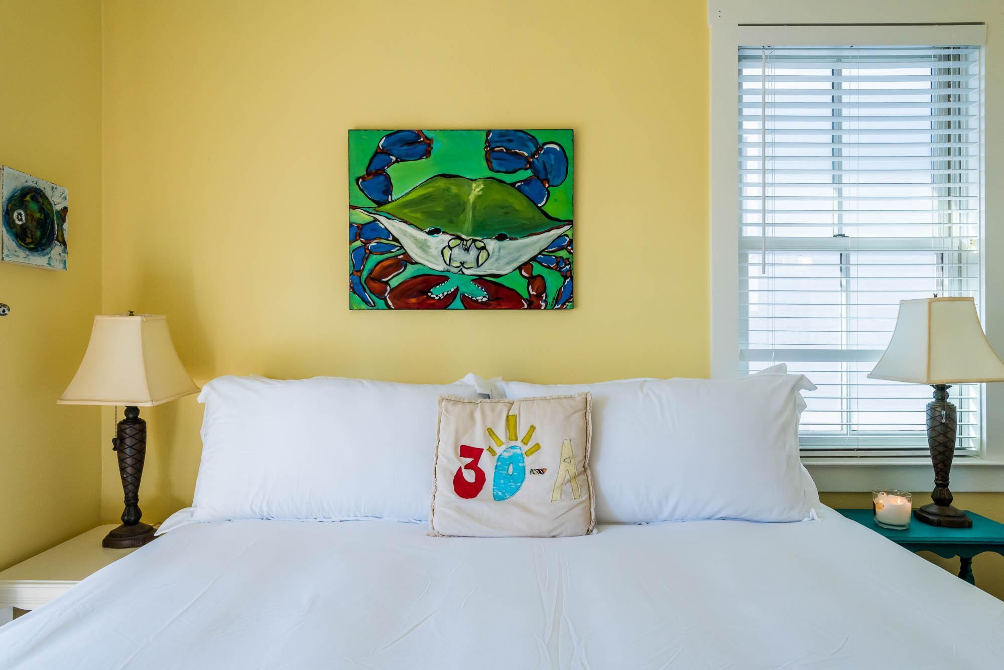 10140 East County Highway 30A, Unit 14 Inlet Beach, FL 32461 - Photo 14 of 14 a bedroom with a bed and a painting on the wall