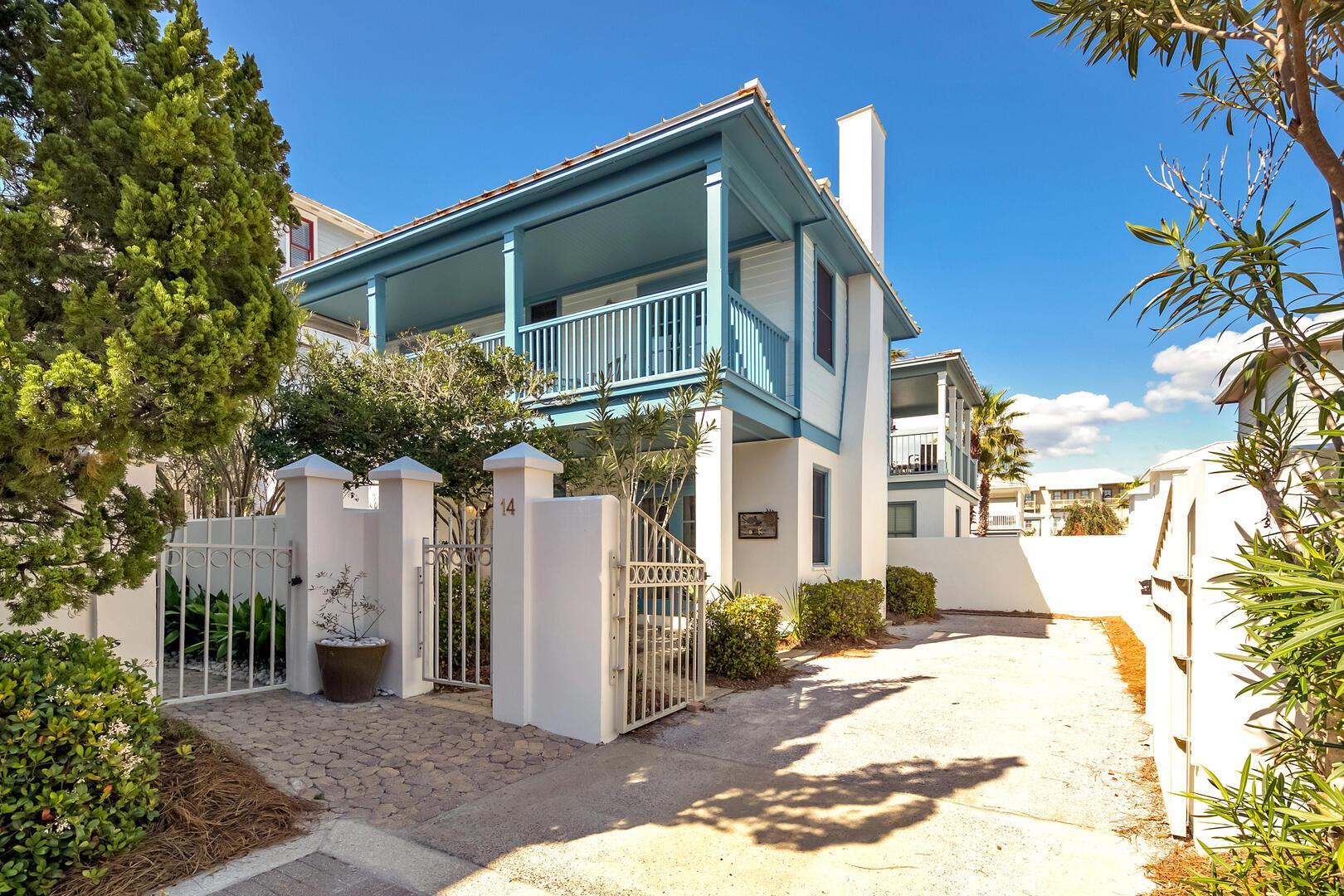 10140 East County Highway 30A, Unit 14 Inlet Beach, FL 32461 - Photo 2 of 14 a front view of a house with a yard