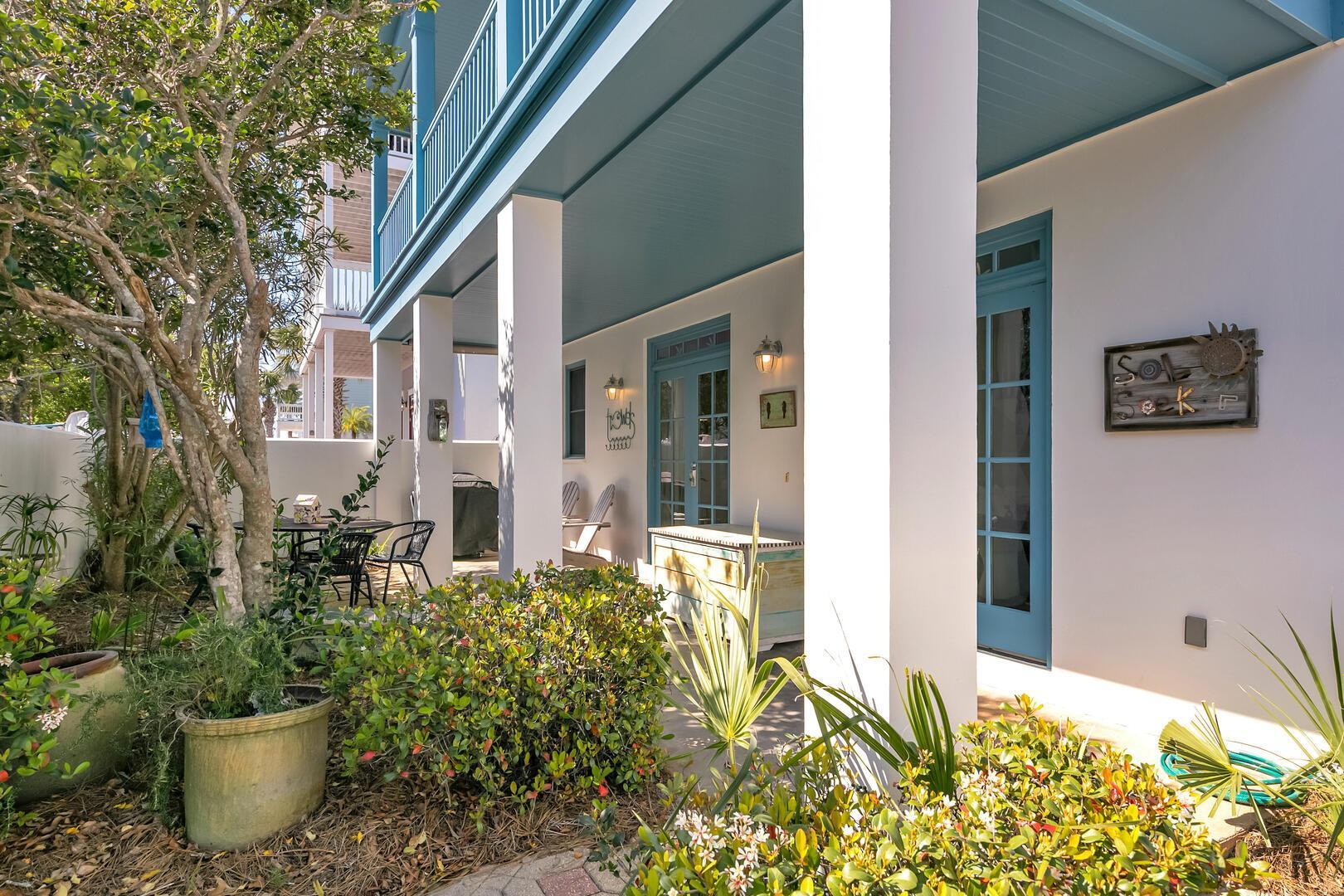 10140 East County Highway 30A, Unit 14 Inlet Beach, FL 32461 - Photo 3 of 14 a front view of a house with an outdoor space
