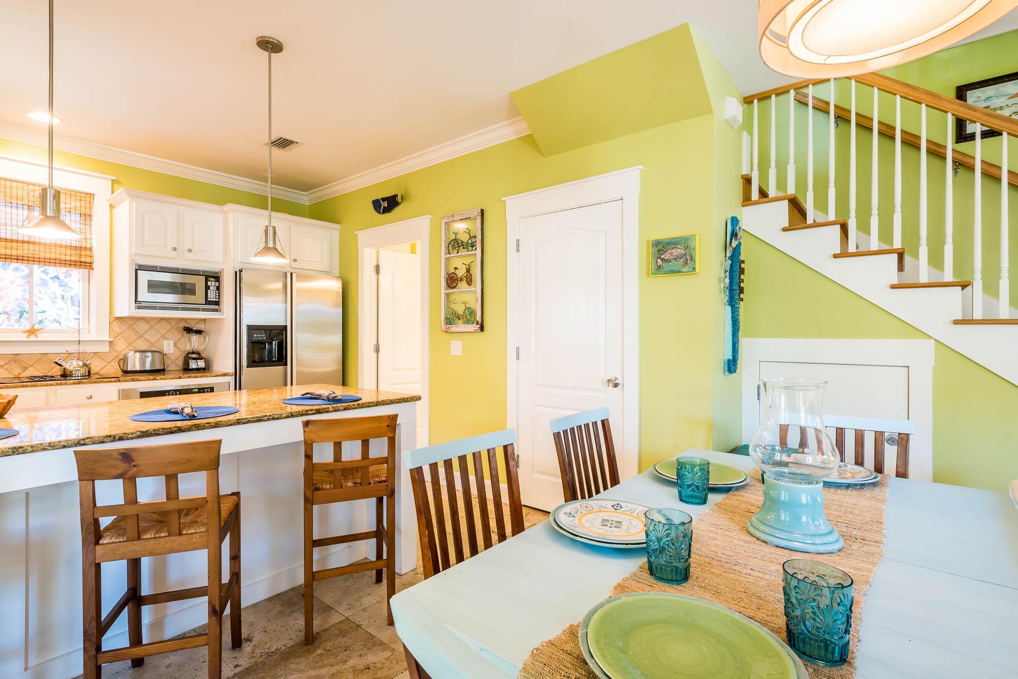 10140 East County Highway 30A, Unit 14 Inlet Beach, FL 32461 - Photo 8 of 14 a view of a dining room with furniture window and wooden floor