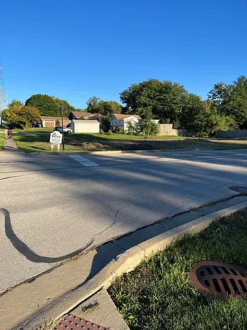 a view of a back yard of the house
