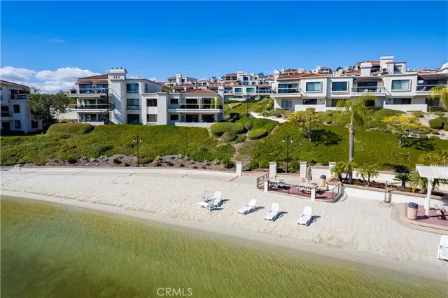 a view of multiple houses with a yard