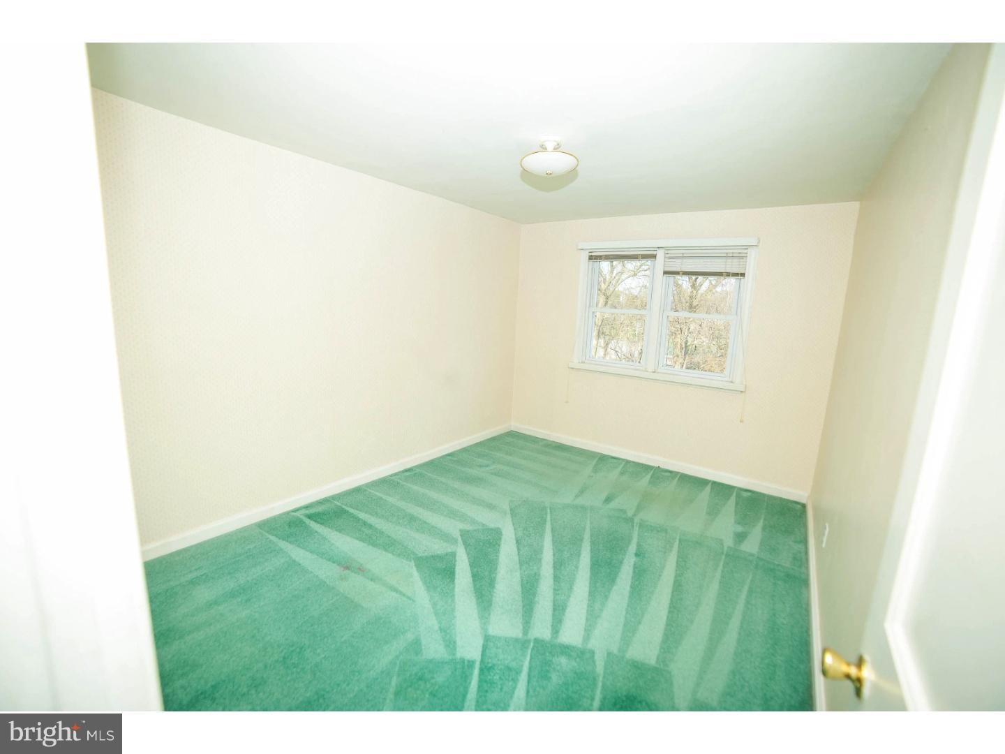 241 Barclay Road Upper Darby, PA 19082 - Photo 7 of 13 a view of an empty room with a window