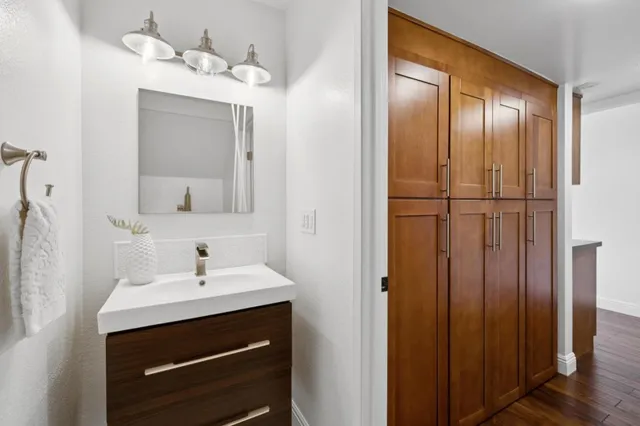 a bathroom with a sink and a mirror