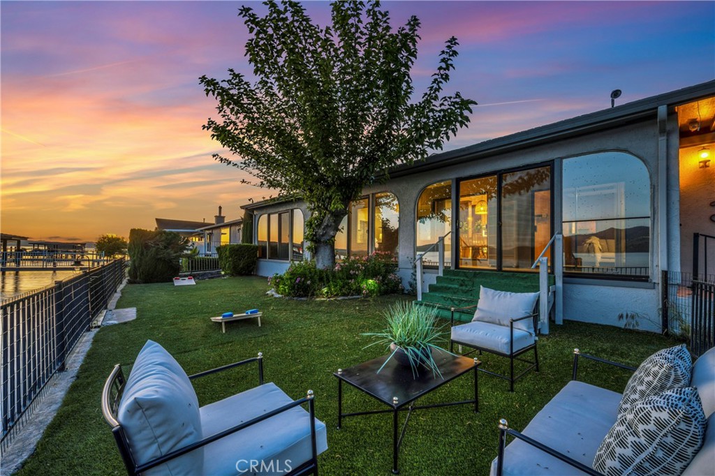 7723 Cora Drive Lucerne, CA 95458 - Photo 2 of 56 a view of a chair and tables in the patio