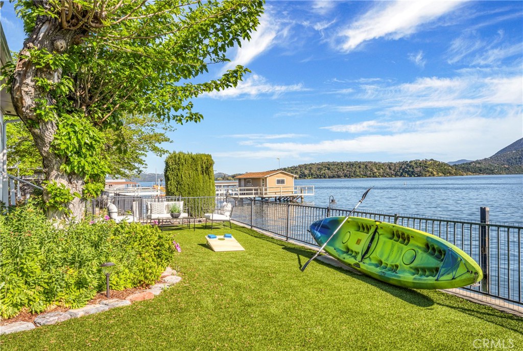 7723 Cora Drive Lucerne, CA 95458 - Photo 32 of 56 a view of swimming pool with a garden and seating area