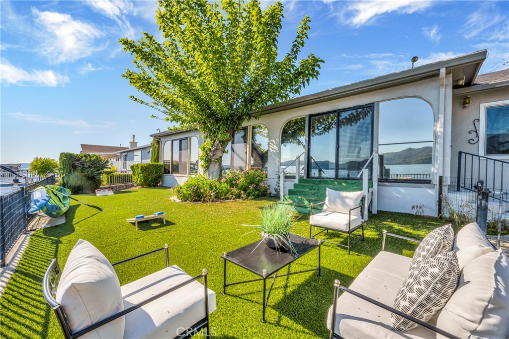 7723 Cora Drive Lucerne, CA 95458 - Photo 33 of 56 a view of backyard of house with seating space